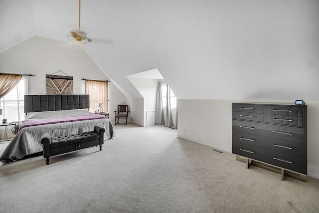 bedroom featuring ceiling fan, carpet floors, and lofted ceiling
