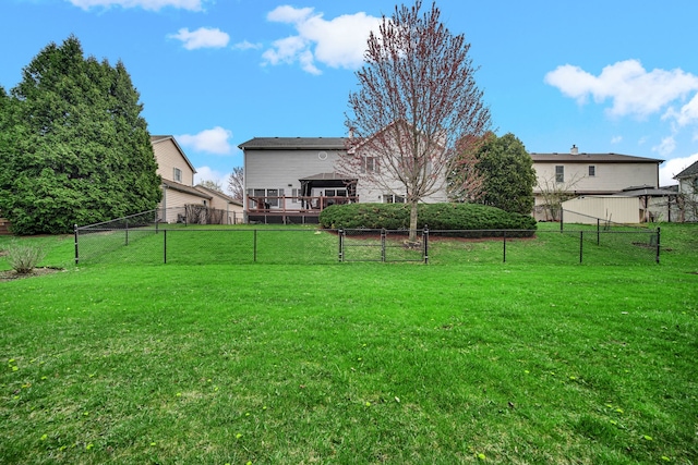 view of yard with fence and a gazebo