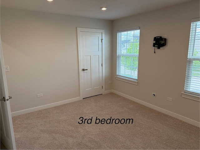 1840 Tall Oaks Dr, Antioch, IL 60002 - unfurnished room featuring light carpet, baseboards, and recessed lighting