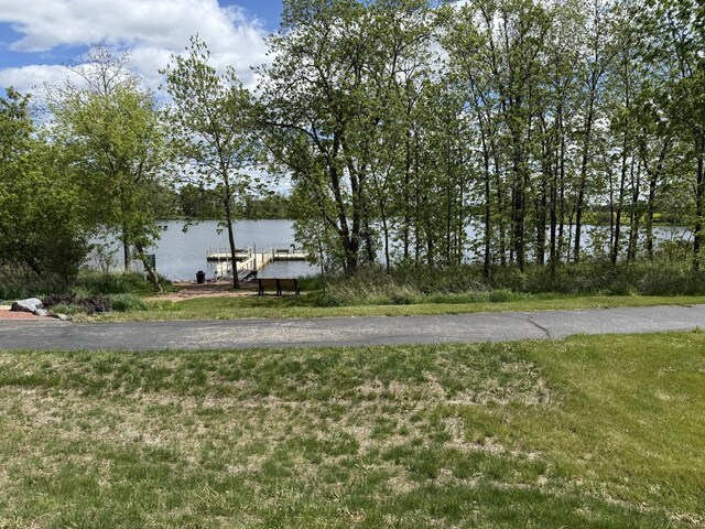 1840 Tall Oaks Dr, Antioch, IL 60002 - dock area with a water view and a lawn