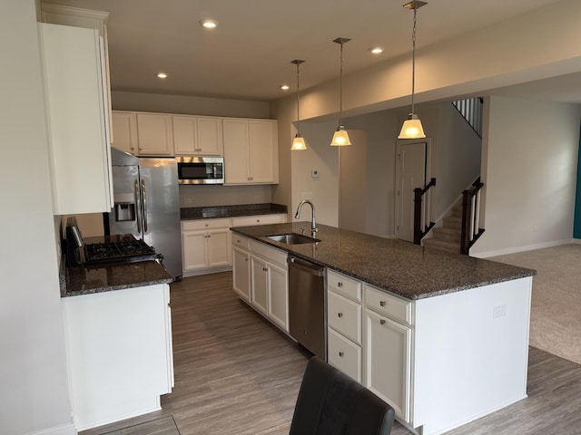 1840 Tall Oaks Dr, Antioch, IL 60002 - kitchen featuring a sink, appliances with stainless steel finishes, white cabinetry, recessed lighting, and dark stone counters