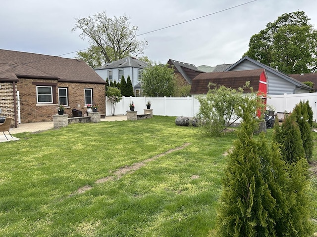 view of yard with a patio area