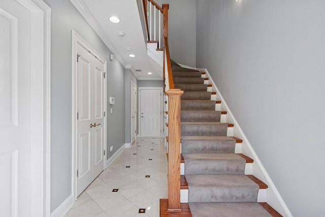 stairs with recessed lighting, baseboards, ornamental molding, and tile patterned floors