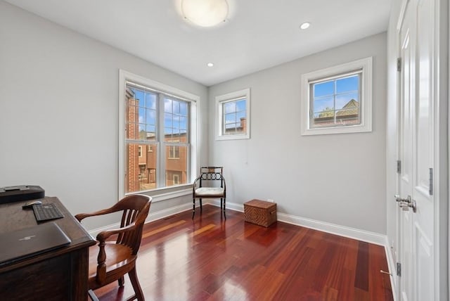 office space with baseboards, recessed lighting, and wood finished floors