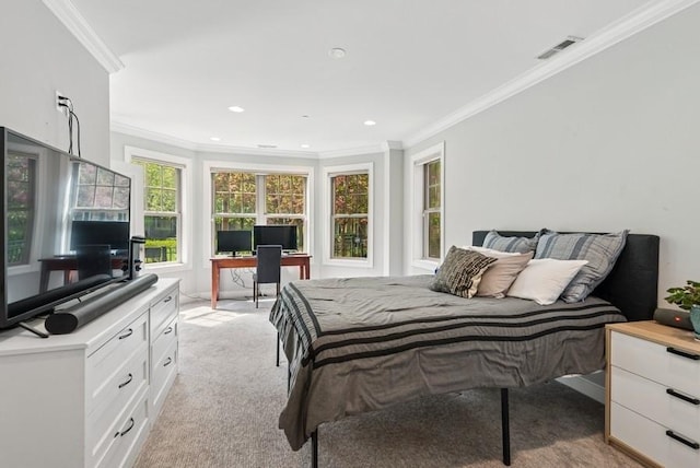 bedroom featuring crown molding, light carpet, and visible vents