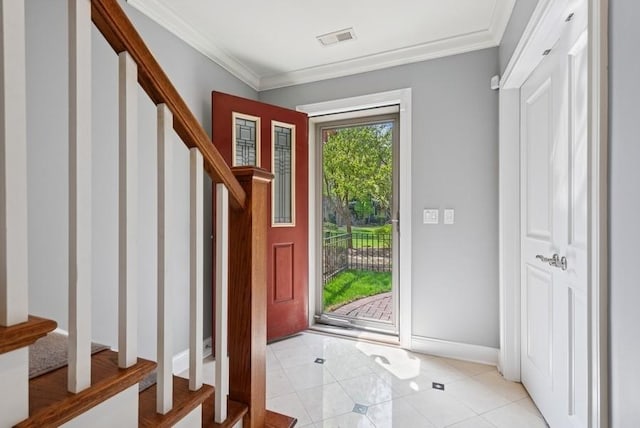 entryway featuring crown molding, visible vents, baseboards, stairway, and light tile patterned floors