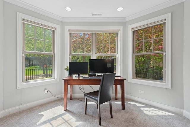 carpeted home office featuring crown molding, baseboards, and visible vents