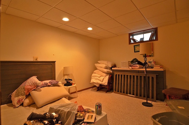bedroom with recessed lighting, a paneled ceiling, and carpet flooring