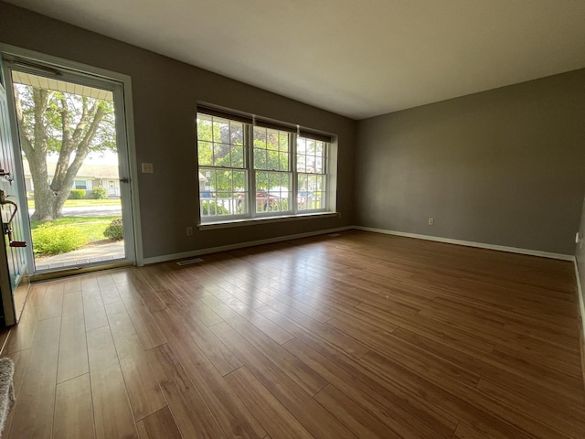 201 Meadows Rd S, Bourbonnais, IL 60914 - spare room with wood finished floors and baseboards