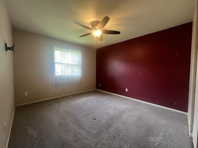201 Meadows Rd S, Bourbonnais, IL 60914 - spare room featuring a ceiling fan, carpet, and baseboards
