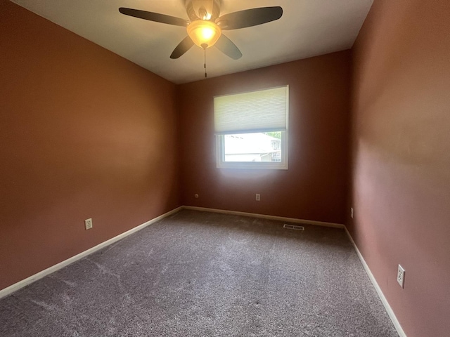 201 Meadows Rd S, Bourbonnais, IL 60914 - carpeted spare room with a ceiling fan and baseboards