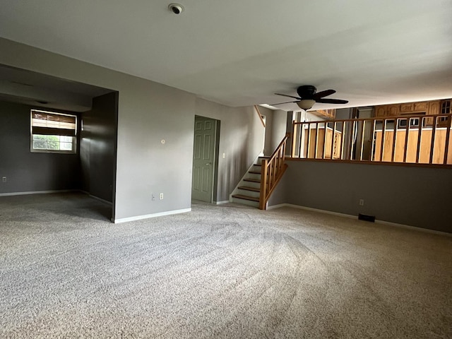 201 Meadows Rd S, Bourbonnais, IL 60914 - carpeted spare room with ceiling fan, baseboards, and stairway