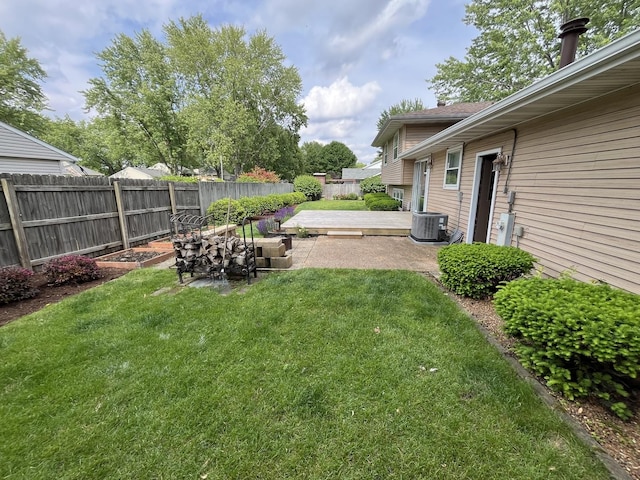 201 Meadows Rd S, Bourbonnais, IL 60914 - view of yard with central air condition unit and a patio