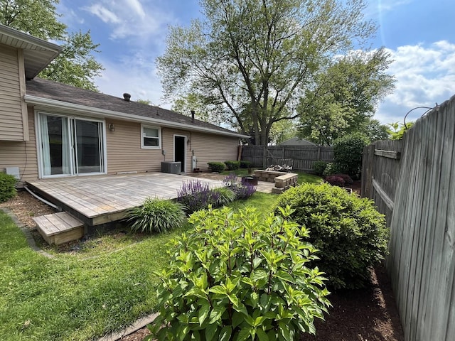 201 Meadows Rd S, Bourbonnais, IL 60914 - fenced backyard featuring a wooden deck and cooling unit