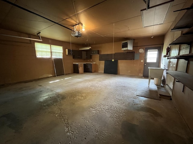 201 Meadows Rd S, Bourbonnais, IL 60914 - garage featuring a garage door opener