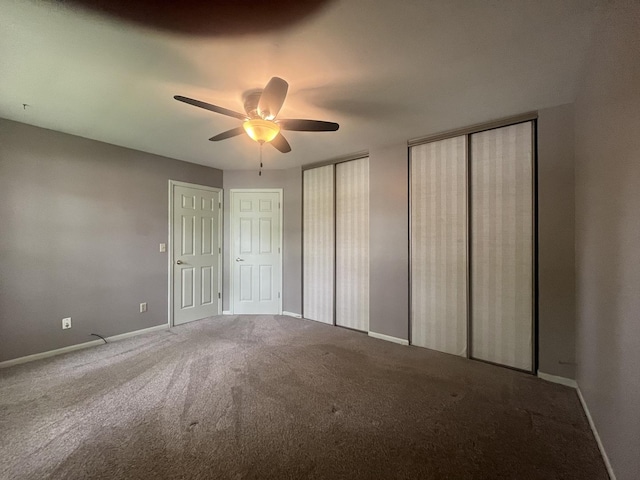 201 Meadows Rd S, Bourbonnais, IL 60914 - unfurnished bedroom featuring two closets, carpet, and baseboards