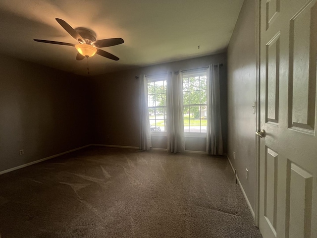201 Meadows Rd S, Bourbonnais, IL 60914 - carpeted empty room featuring a ceiling fan and baseboards