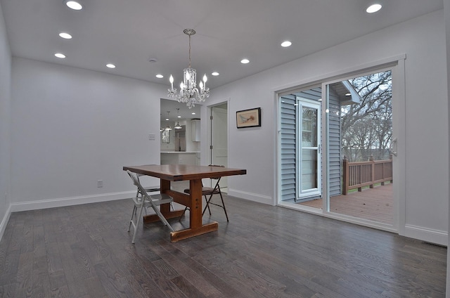dining space featuring recessed lighting, dark wood-style flooring, a notable chandelier, visible vents, and baseboards