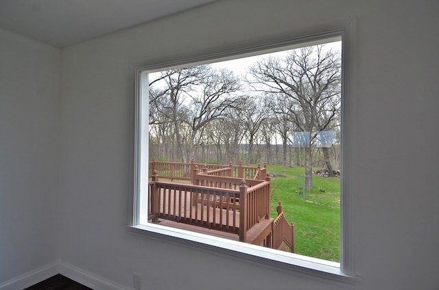 exterior space featuring a healthy amount of sunlight and baseboards