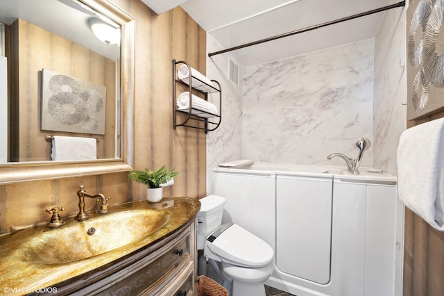 155 N Harbor Dr Unit 1112-13, Chicago, IL 60601 - full bath with visible vents, toilet, a washtub, and vanity