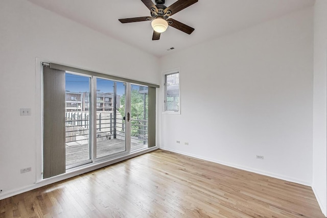 512 N Claremont Ave Unit 2, Chicago, IL 60612 - unfurnished room featuring wood finished floors, ceiling fan, and baseboards