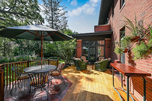 4019 Howard Ave, Western Springs, IL 60558 - wooden deck with outdoor dining area and an outdoor hangout area