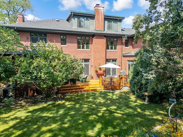 4019 Howard Ave, Western Springs, IL 60558 - back of house with a chimney, a lawn, brick siding, and a shingled roof