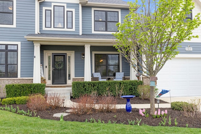 view of front of house featuring a porch and a shingled roof