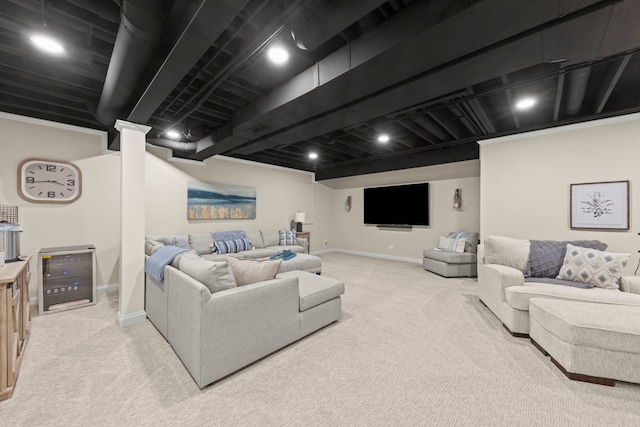 living room with beverage cooler, baseboards, and light carpet
