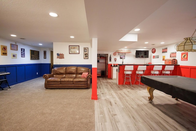 game room with wet bar, wainscoting, pool table, and recessed lighting