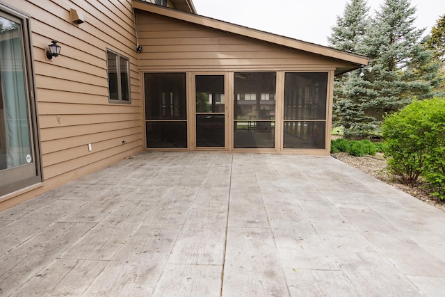 view of patio / terrace with a sunroom