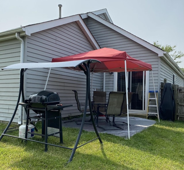 exterior space with a yard and a patio
