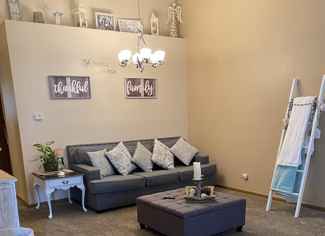 living room featuring baseboards, a chandelier, and carpet floors