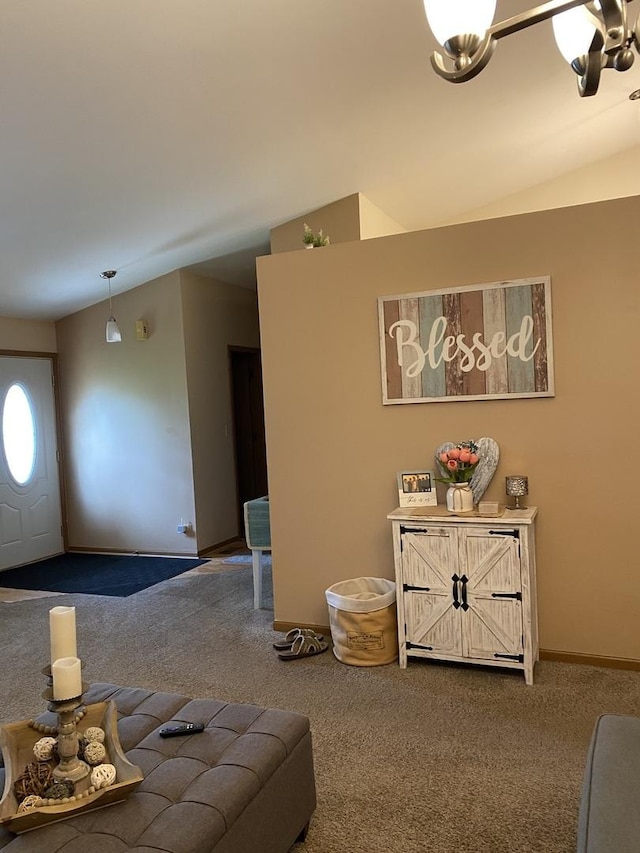 living room with carpet flooring, vaulted ceiling, and baseboards