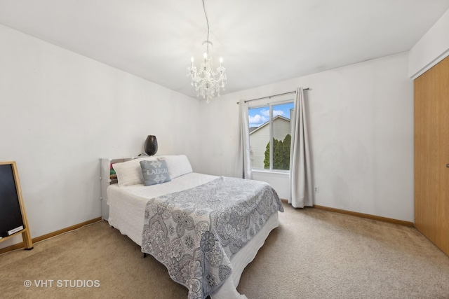 244 Tammanny Ln, Romeoville, IL 60446 - bedroom featuring light colored carpet, a chandelier, and baseboards