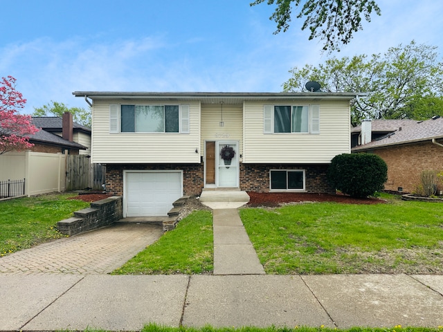 3729 W 121st St, Alsip, IL 60803 - raised ranch featuring brick siding, fence, driveway, and a front yard
