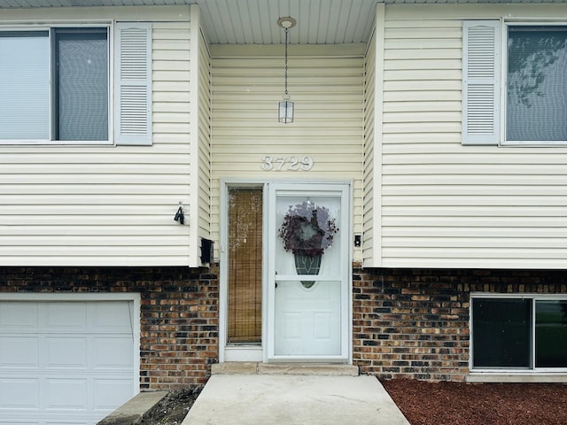 3729 W 121st St, Alsip, IL 60803 - property entrance with brick siding and a garage