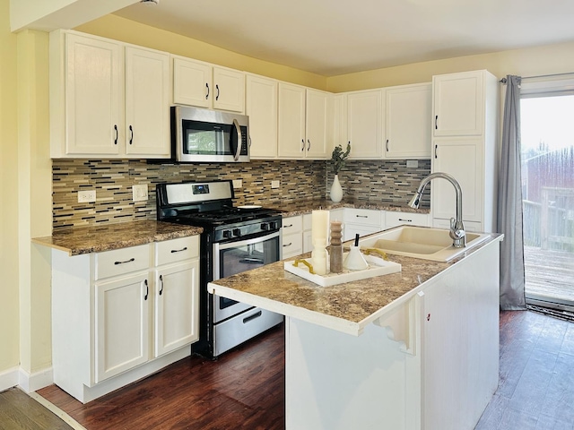 3729 W 121st St, Alsip, IL 60803 - kitchen featuring a sink, appliances with stainless steel finishes, white cabinets, and dark wood-style flooring