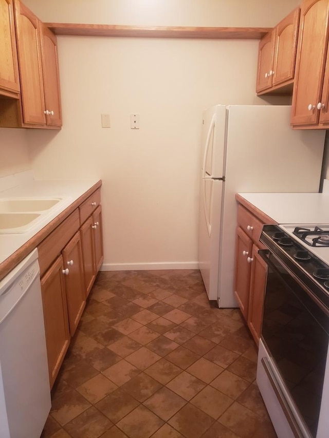 277 Shorewood Dr Unit 2A, Glendale Heights, IL 60139 - kitchen featuring a sink, light countertops, white dishwasher, baseboards, and gas stove