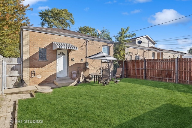 3553 W 77th St, Chicago, IL 60652 - view of front of property with brick siding, fence private yard, and a front yard