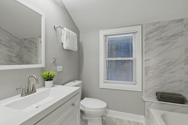 9221 S Lowe Ave, Chicago, IL 60620 - full bathroom with a bathing tub, marble finish floor, vaulted ceiling, toilet, and vanity