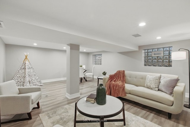 9221 S Lowe Ave, Chicago, IL 60620 - living room featuring visible vents, light wood-type flooring, and recessed lighting