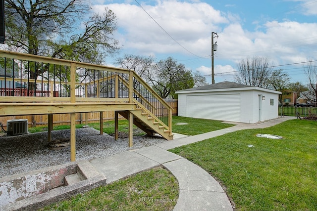 9221 S Lowe Ave, Chicago, IL 60620 - view of yard featuring central air condition unit, an outdoor structure, stairs, a deck, and fence