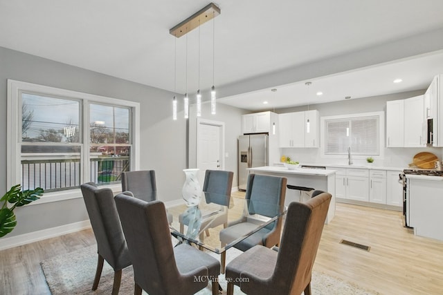 9221 S Lowe Ave, Chicago, IL 60620 - dining space with visible vents, recessed lighting, light wood-style flooring, and baseboards