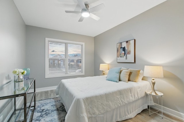 9221 S Lowe Ave, Chicago, IL 60620 - bedroom with wood finished floors, ceiling fan, and baseboards