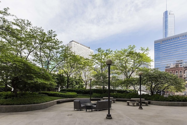 view of community with a patio and outdoor lounge area