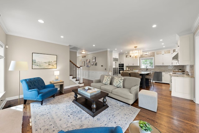 569 Prairie Ave, Glen Ellyn, IL 60137 - living area with crown molding, a chandelier, dark wood-style floors, stairway, and recessed lighting