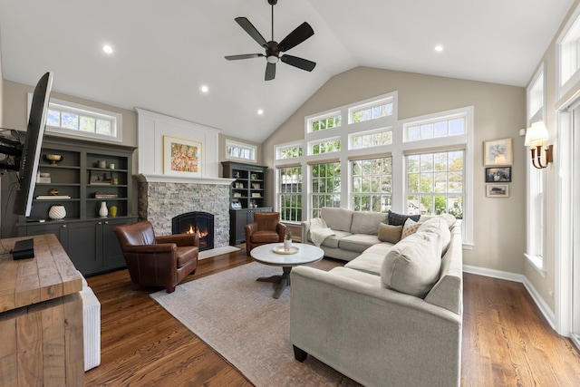 569 Prairie Ave, Glen Ellyn, IL 60137 - living room featuring a fireplace, a ceiling fan, wood finished floors, high vaulted ceiling, and recessed lighting
