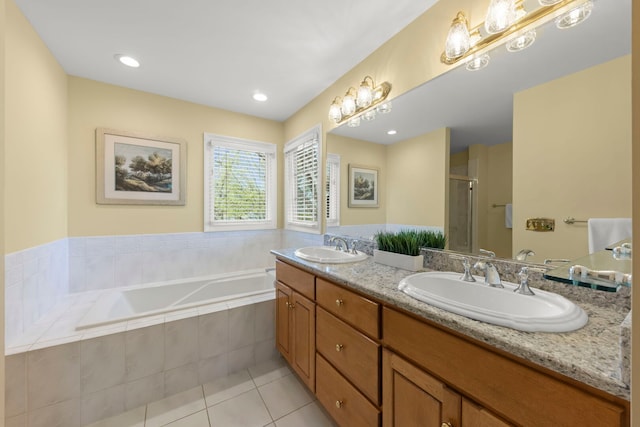569 Prairie Ave, Glen Ellyn, IL 60137 - full bathroom with a garden tub, tile patterned flooring, a stall shower, and double vanity