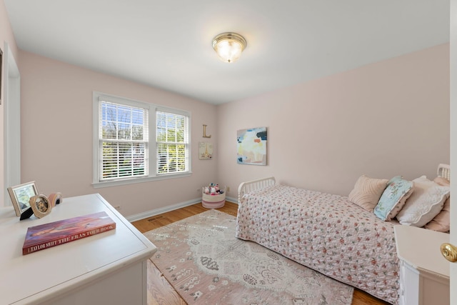 569 Prairie Ave, Glen Ellyn, IL 60137 - bedroom featuring light wood-style flooring and baseboards